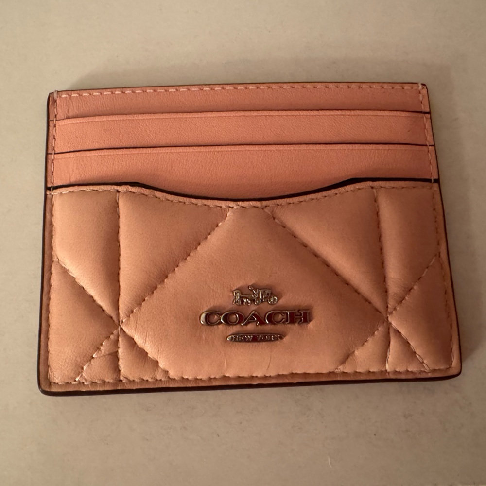 Blush pink Coach card wallet